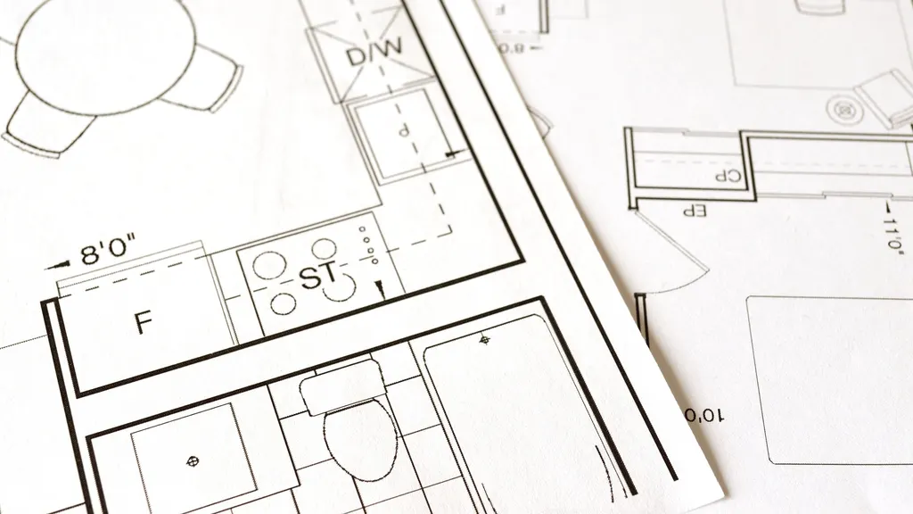 A printed floor plan showing room layouts and measurements.